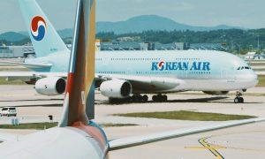 Korean Air airplane on runway.